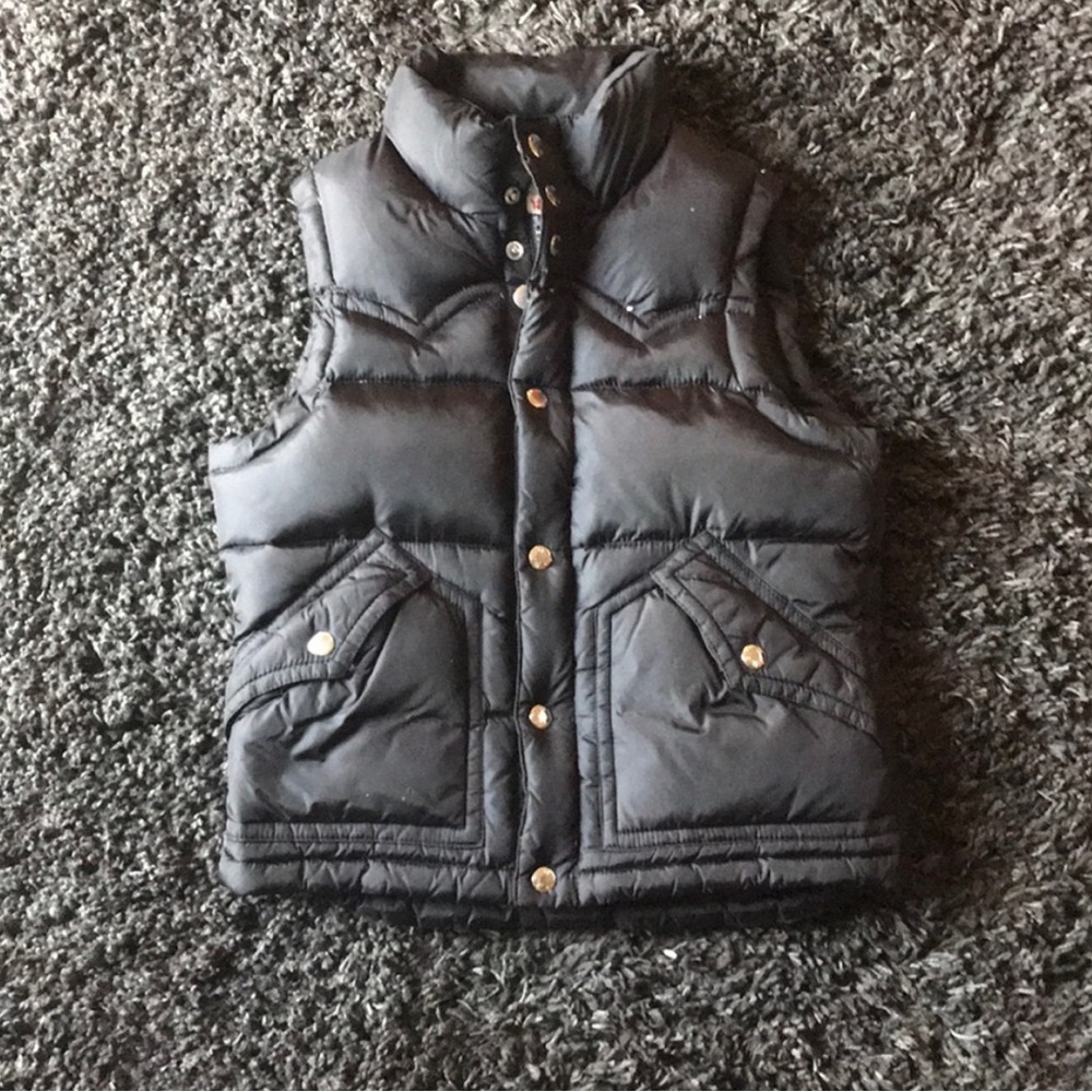 Looking for a vest and a pair of true religion jeans that look like this